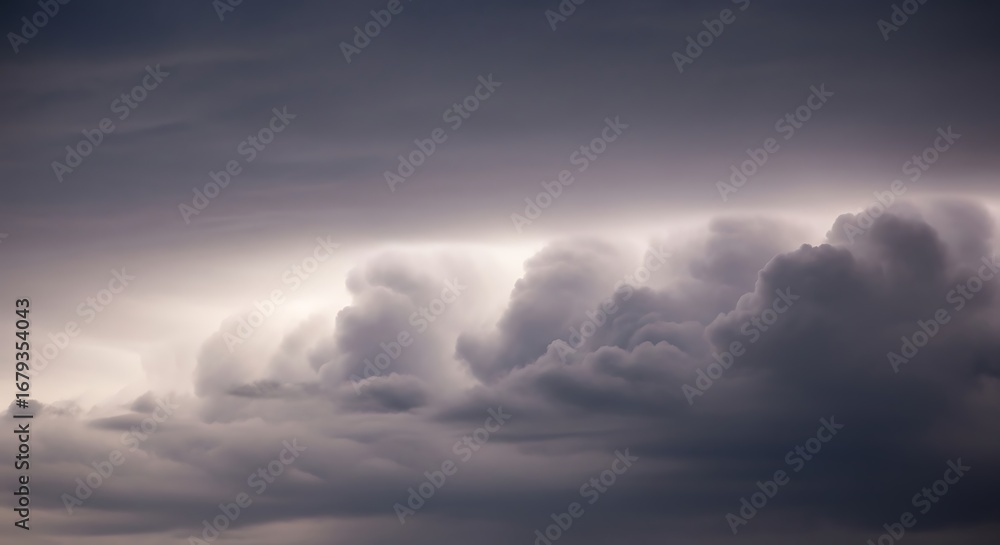 Fototapeta premium Dramatic storm clouds fill the sky with dark beauty