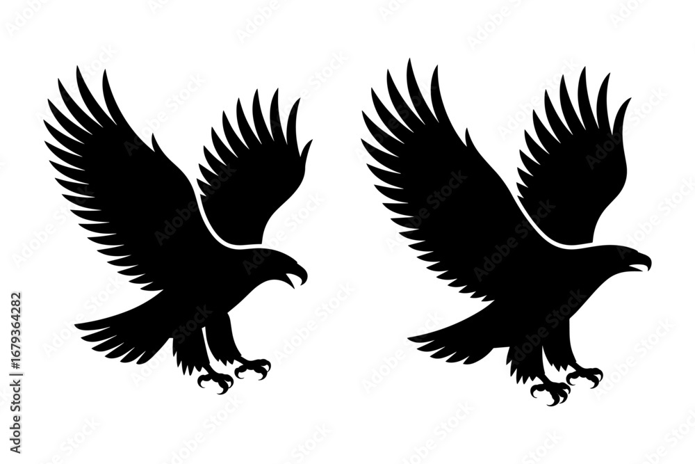 Obraz premium silhouette of majestic eagles soaring with outstretched wings, symbol of freedom and power