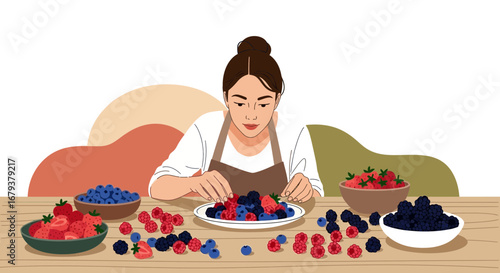 Woman Arranging Mixed Berries on a Table, Preparing Dessert Components