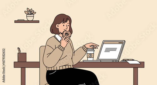 Woman eating donut while working on laptop in modern office with coffee cup