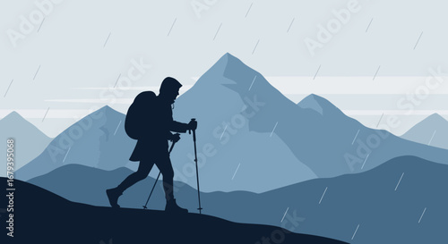 Silhouette of a Hiker Walking in the Mountains with Rain Falling with a Backpack