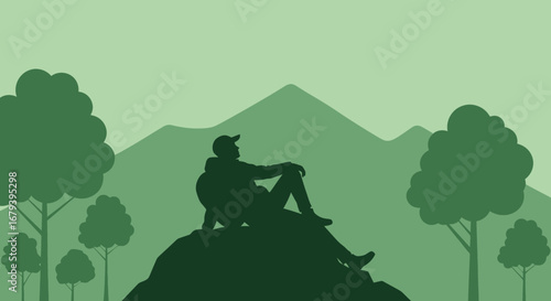 Silhouette Of A Person Resting On a Rock Observing The Mountains In Nature