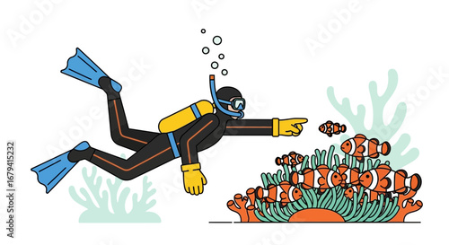 Scuba diver pointing at clownfish underwater in a vibrant coral reef environment