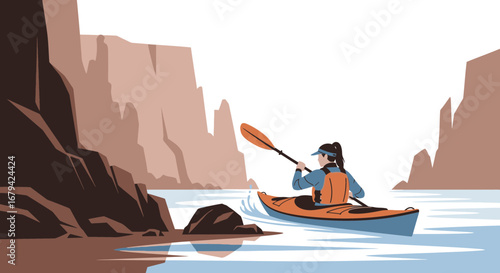 Kayaking adventure in a canyon with a person paddling the kayak on the water