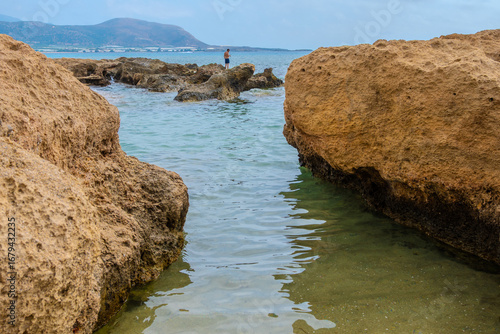 Tranquil Water Channel Between Large Rocks at baby beach Falassarna