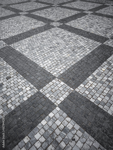 Photography Prague Cobblestone pavement forming geometric pattern in city square