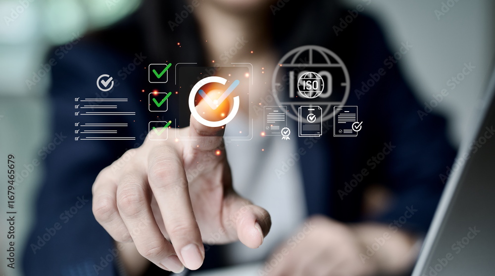 Obraz premium Business professional touching virtual checklist icon with ISO certification symbols, representing quality assurance, compliance, business standards, and management system for corporate excellence.