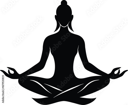 Silhouette of a person meditating in the lotus position