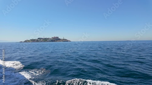 Exciting boat ride showcasing beautiful coastline and distant island scenery on a clear day