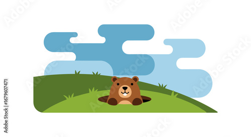 Cute groundhog peeking from its burrow on a grassy hill.