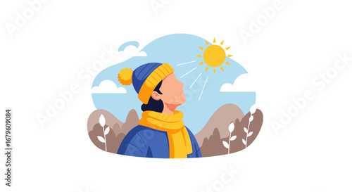 Person in winter attire looking up at the sky enjoying the sunny cold weather.