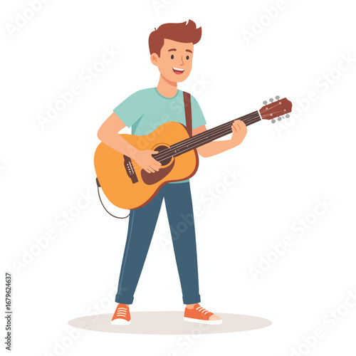 A smiling young man plays an acoustic guitar, enjoying the music.