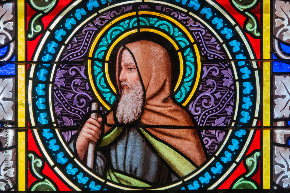 Fototapeta premium Stained glass (19th century) of Saint Romain. Catholic Saint.