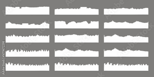 Collection of diverse white abstract irregular jagged torn paper edge shapes on a gray background