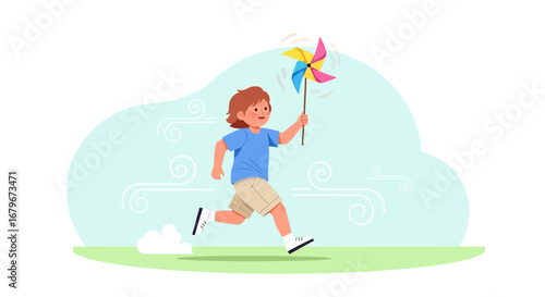 Happy child running with a pinwheel in his hand playing joyfully on a sunny day