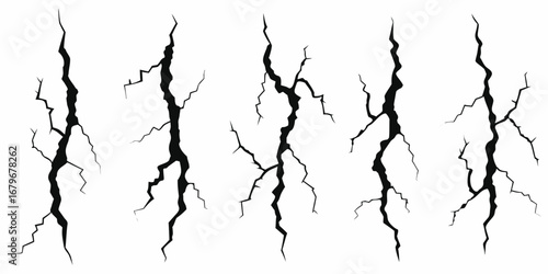 Set of five black crack illustrations on a white background representing seismic activity or structural damage