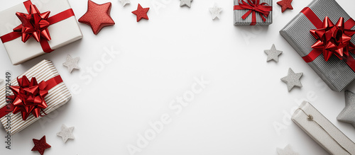white background with red and gold ribbon gifts on the left side of the frame, the right half blank for text or graphic design. christmas concept banner. white background with red and golden gift boxe