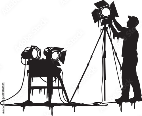 Silhouette of a filmmaker adjusting a lighting fixture during fi