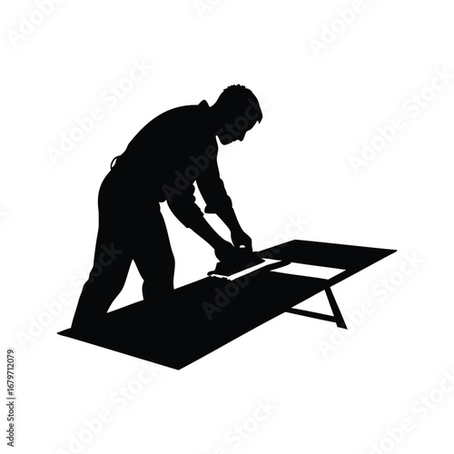 Silhouette of a man applying something to a flat surface using tool, cutting metal sheet silhouette vector illustration