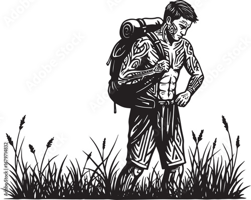Tattooed adventurer pauses on his journey through grassy terrain