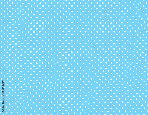 Light blue background with small white polka dots