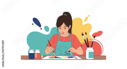 Creative Young Artist Painting Colorful Abstract Designs On Paper With Brushes and Paints