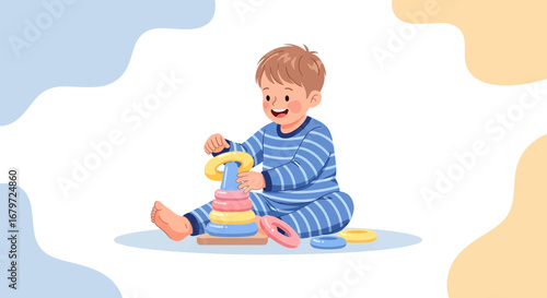 Cute toddler happily playing with a colorful stacking rings toy on a white background