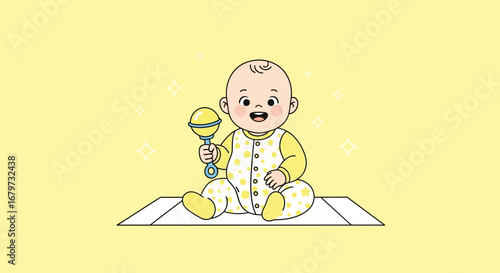 Charming Child Holding Rattle Smiling And Having A Wonderful Time On A Yellow Background