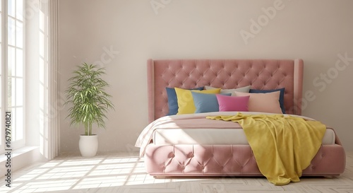 Soft pink tufted bed with colorful pillows and yellow throw cozy bedroom interior design