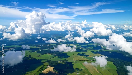 High-angle view of a landscape dotted with puffy clouds
