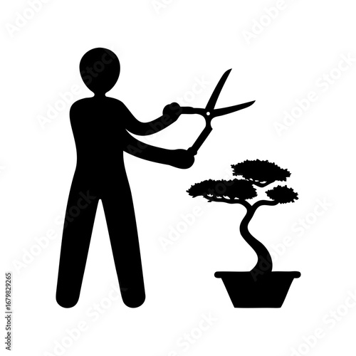 Silhouette of a person trimming a bonsai tree with large shears