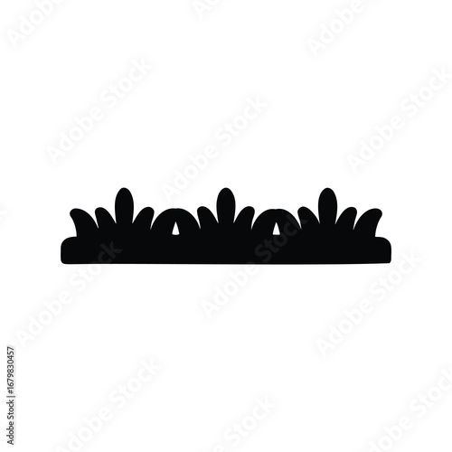 Stylized black grass silhouette on a white background offering a simple design element