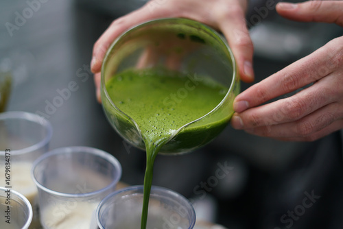 Making japanese matcha latte. Close up. 