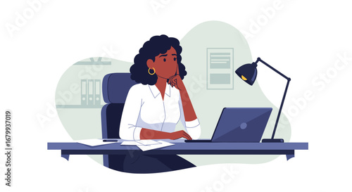 Stressed African American woman at her office desk, contemplating a problem while working on her laptop. Perfect for business, remote work, and mental wellness.