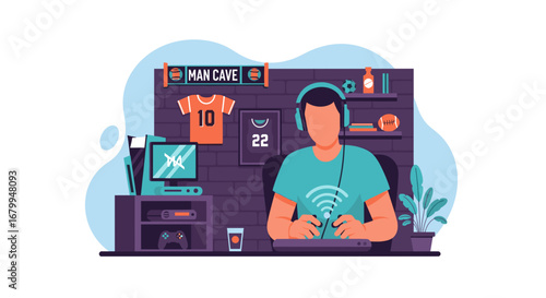 A person wearing headphones enjoying video games in a cozy "man cave" with sports memorabilia and technology. Ideal for leisure, gaming, and entertainment concepts.