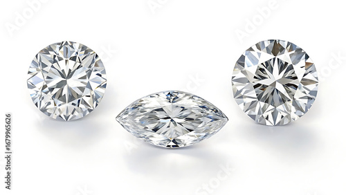 Three diamonds on a white surface showcasing round and marquise cuts with intricate facets and brilliance