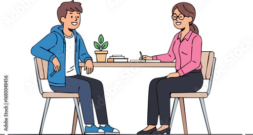 Young man in a consultation with a female professional at a desk.
