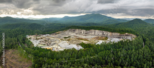 Sand open-pit mining quarry with processing plant for crushed stone. Extracting of natural resources for construction industry