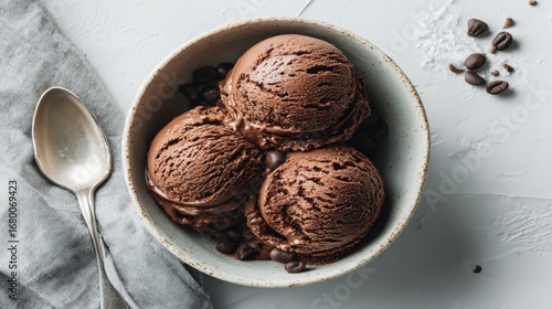 Flat Lay of Chocolate Ice Cream Scoops with Spoon and Cocoa Nibs