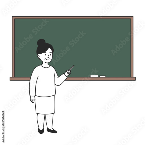 Smiling Female Teacher Presenting Lesson at Chalkboard in Classroom