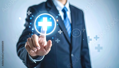 Businessman touching a medical plus sign