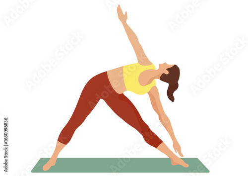 Woman practicing triangle yoga pose on mat. Fitness and workout for healthy lifestyle. Spiritual balance and wellness 
