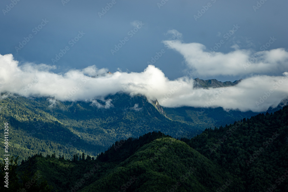 Fototapeta premium clouds over the mountains