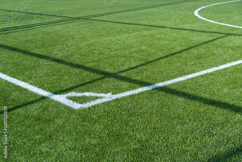 green artificial football or soccer field sport background