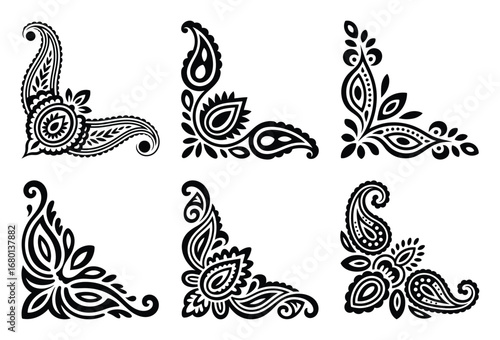 Collection of six decorative paisley corner flourishes isolated on white background