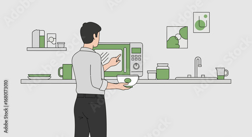 Man preparing food in the kitchen using a microwave for modern cooking and fast recipes