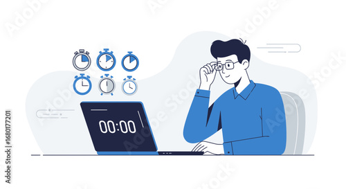 Young professional man working on a laptop facing deadlines and time management effectively