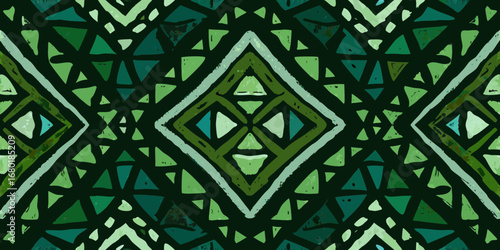Abstract geometric pattern with green and teal diamond shapes and triangles on a dark background