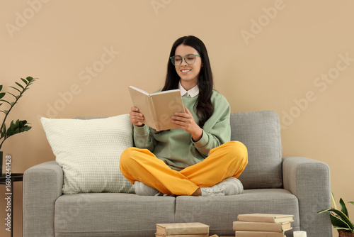 Beautiful woman reading boo...