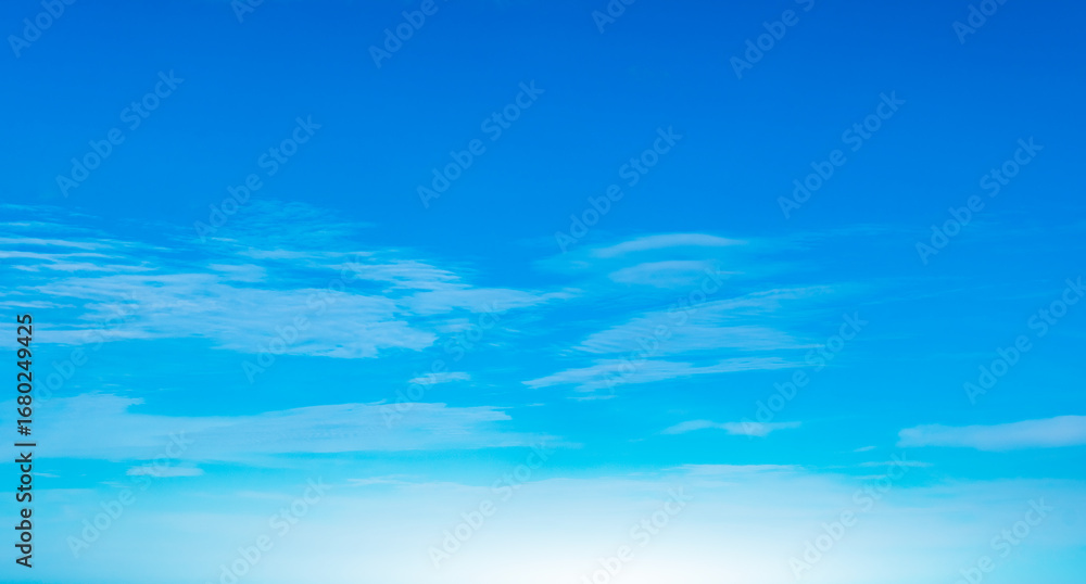 Fototapeta premium Panorama of cloud clear sky background for summer vacation concept at ocean and summer sea water with sunlight of beautiful cloudy 